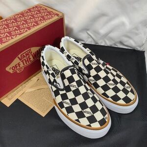 Vans Black and White Checkered Slip-On Sneakers